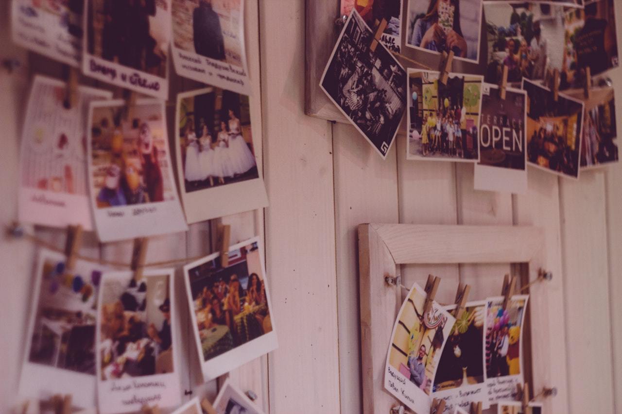Polaroid photos on a wall
