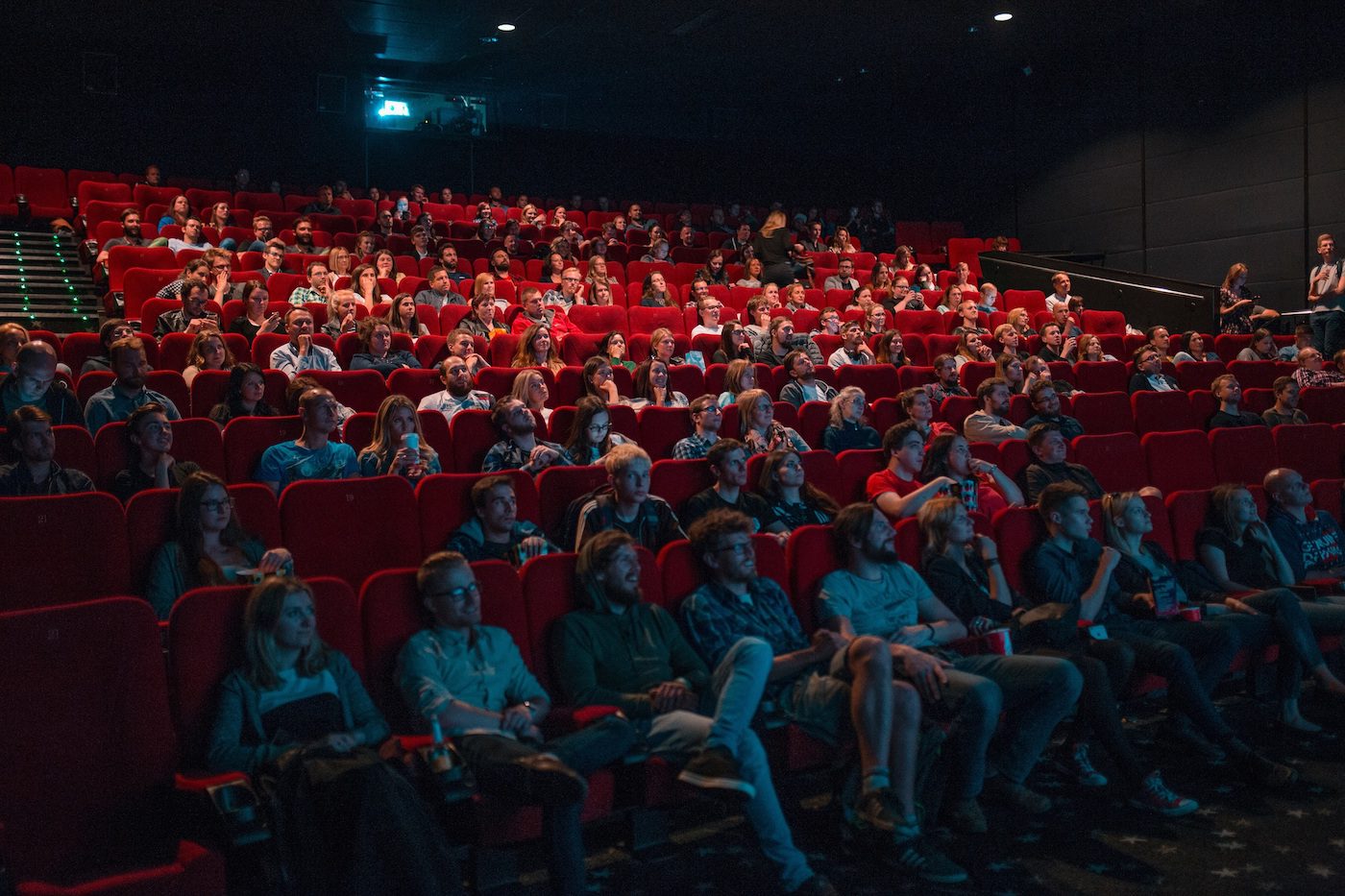 Cinema audiences in red seats