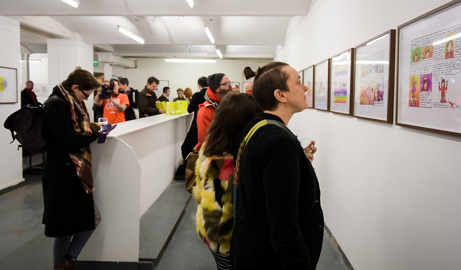People viewing art in a gallery