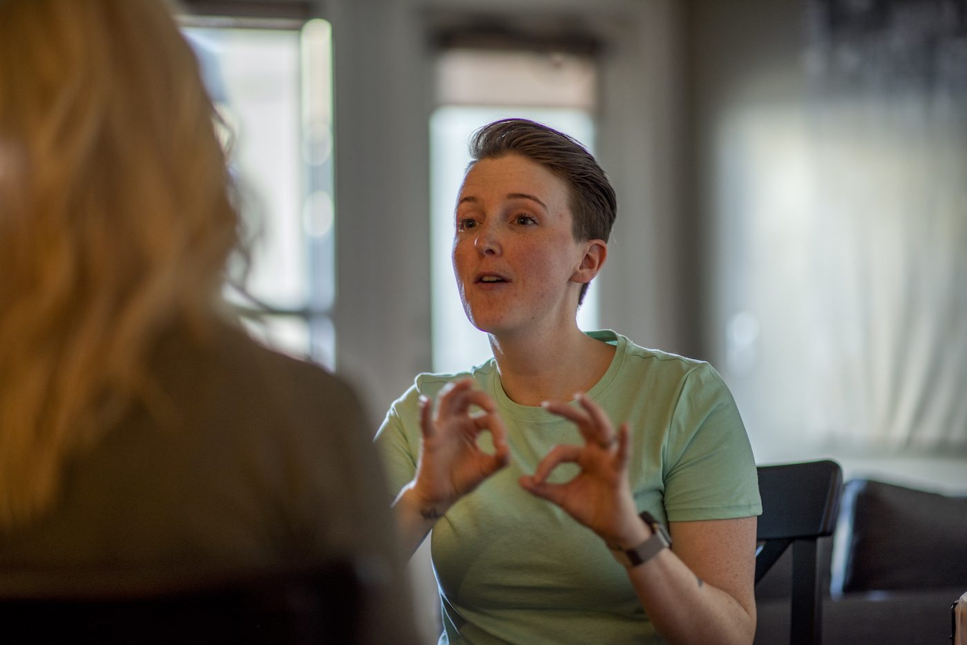 Deaf woman communicating in sign language
