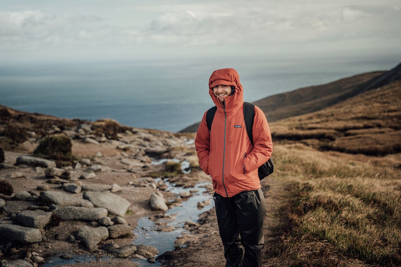 Man in a red zip up jacket