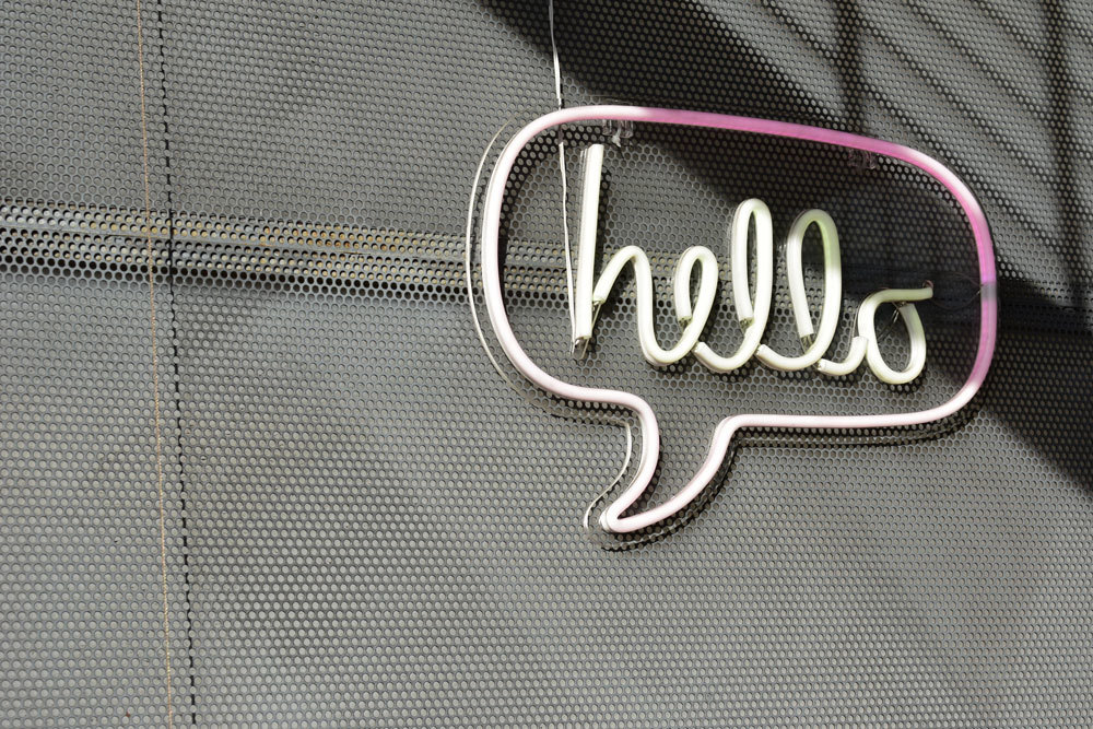 A neon sign reading hello